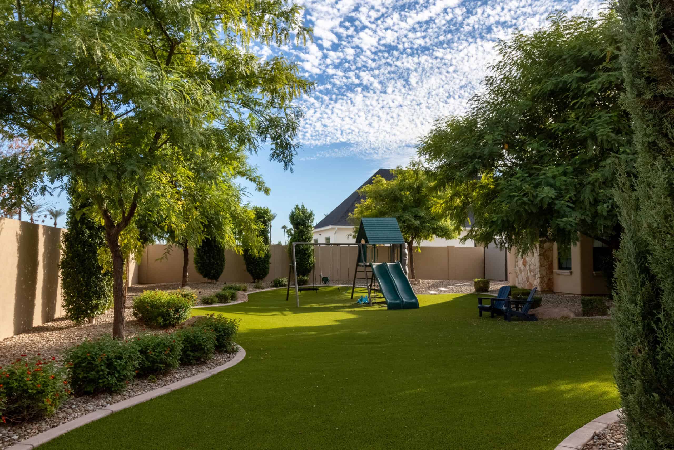 Backyard with a playground and space for family activities